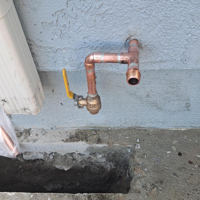 Copper washing machine water line with valve under cement Copper washing machine water line with valve under cement