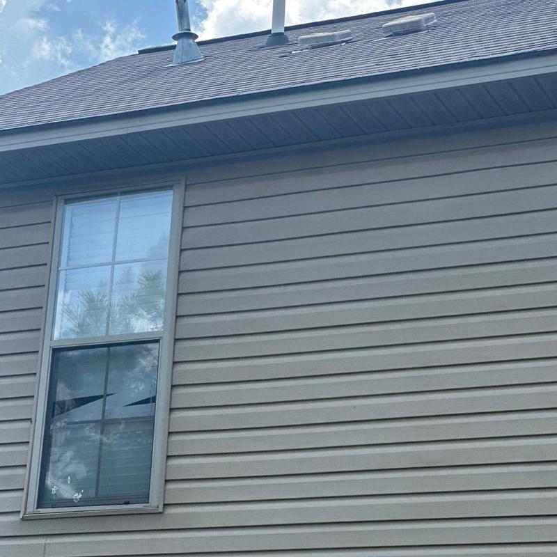 Roof shingles and exterior siding inspection under eaves