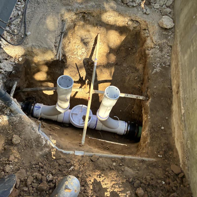 Backwater valve and double clean out installation site