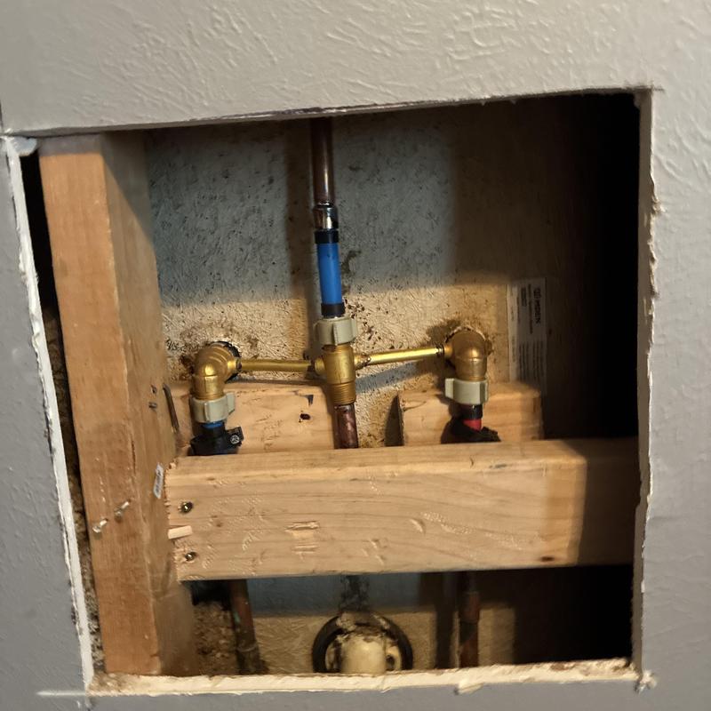 Tub and shower valve with piping installation in wall cavity