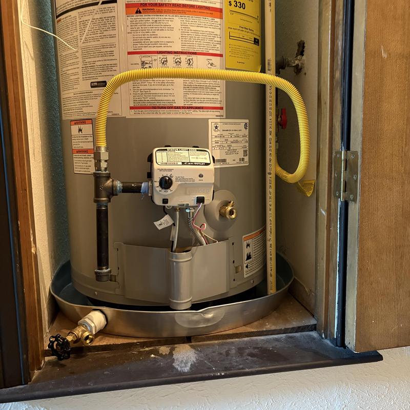 50 gallon gas water heater with new piping installation