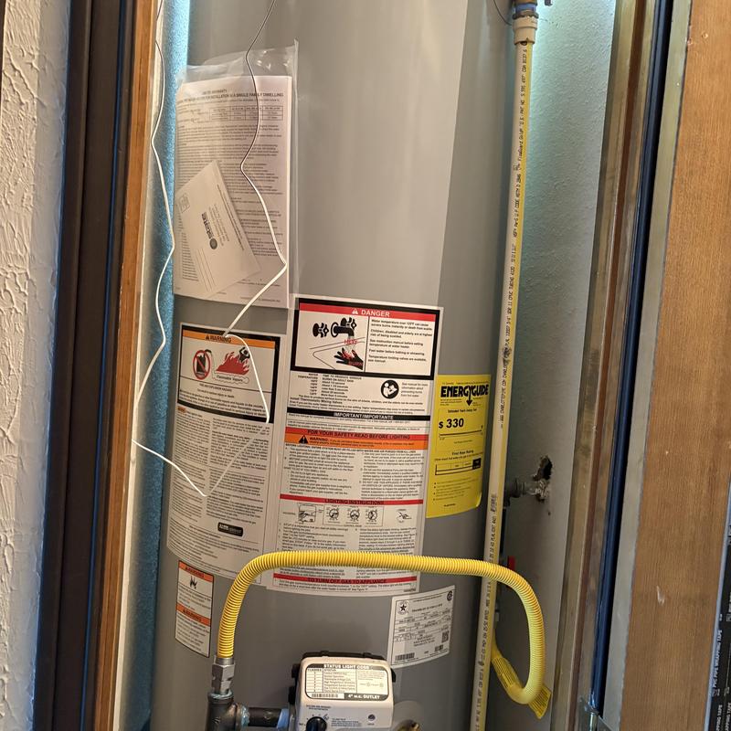 50 gallon gas water heater with yellow gas line