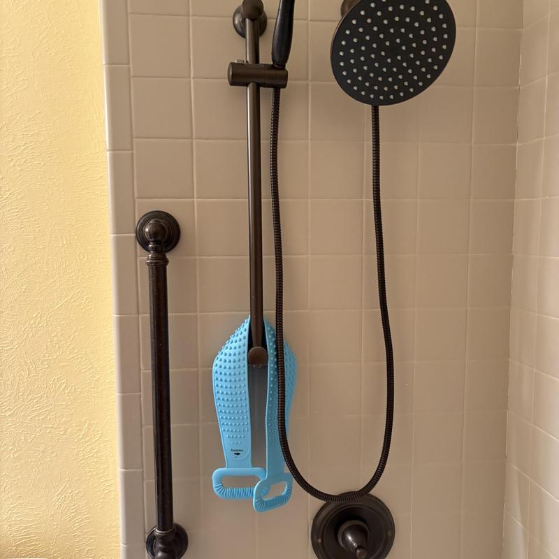 Diverter shower head with handheld sprayer in bathtub