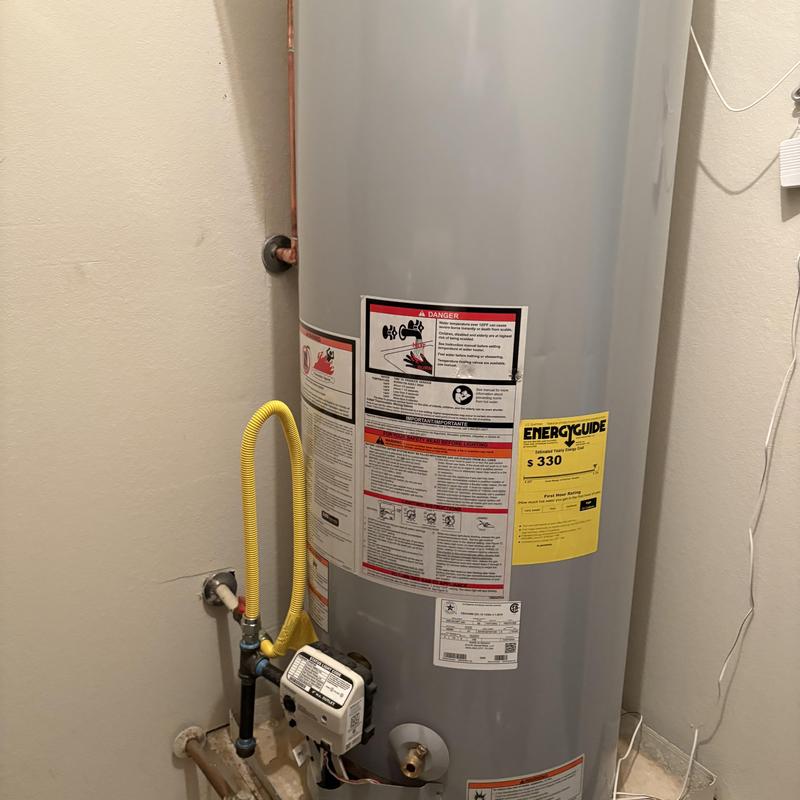 Gas water heater with yellow flexible gas line connection