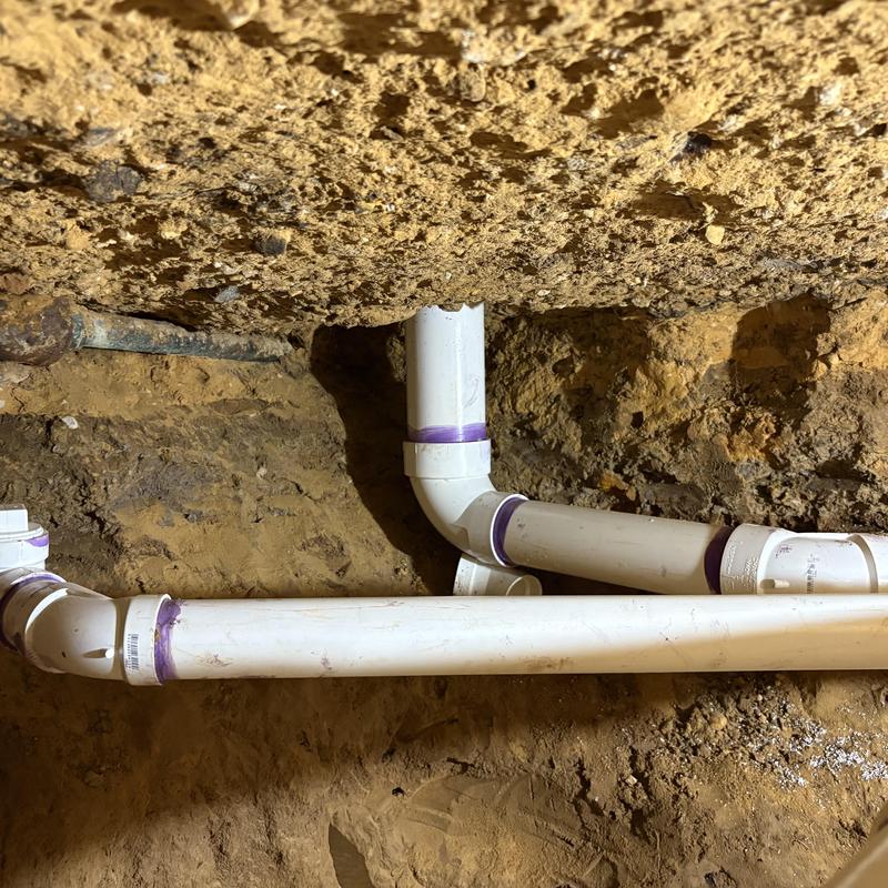 PVC drain pipes in tunnel access for home repipe
