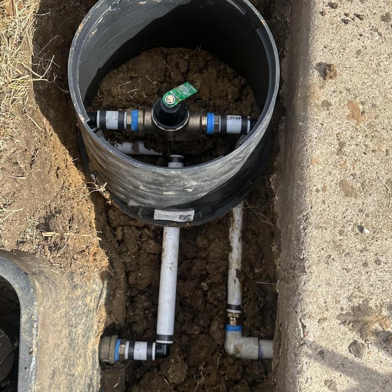Pressure reducing valve with PVC piping in ground