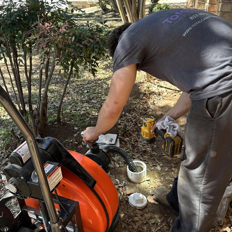 Main drain pipe cleaning with drain snake machine
