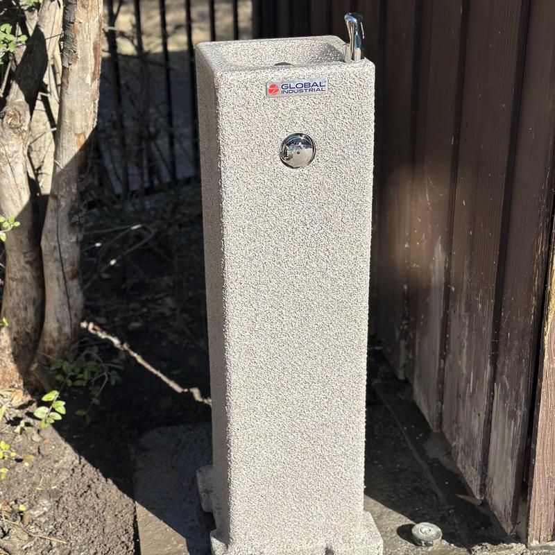 Outdoor water fountain with push button valve