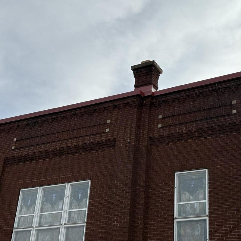 Red cap trim and Flexion XL membrane on parapet wall