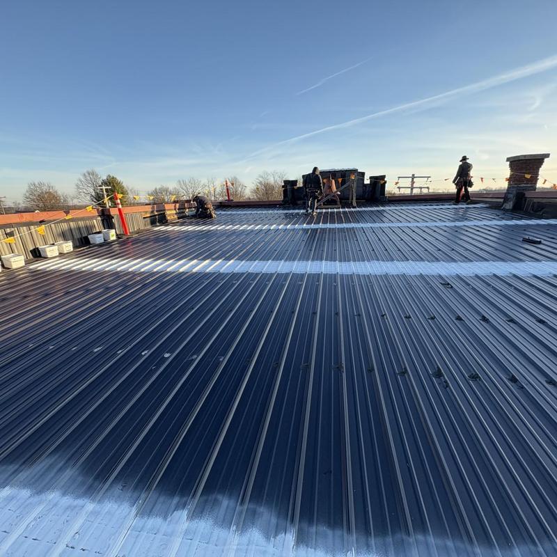 Classic rib metal roof sheathing removal and insulation installation