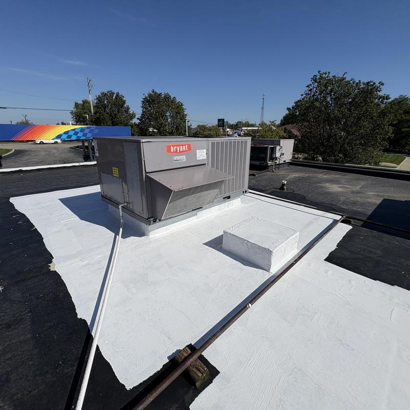 RAPID ROOF III coating on roof around HVAC unit