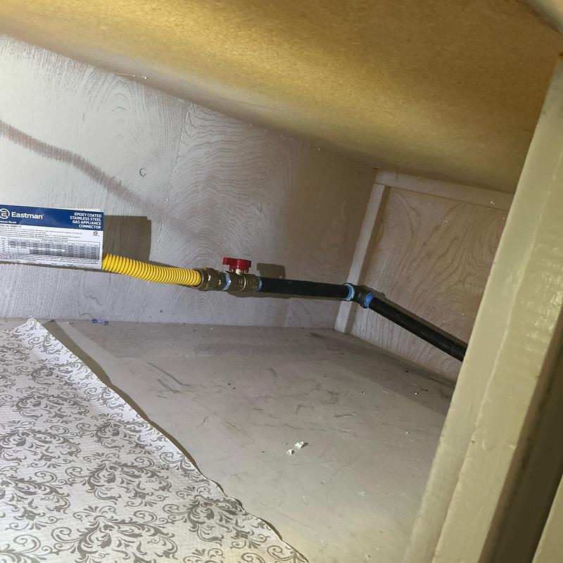 Gas line extension with emergency shut off valve