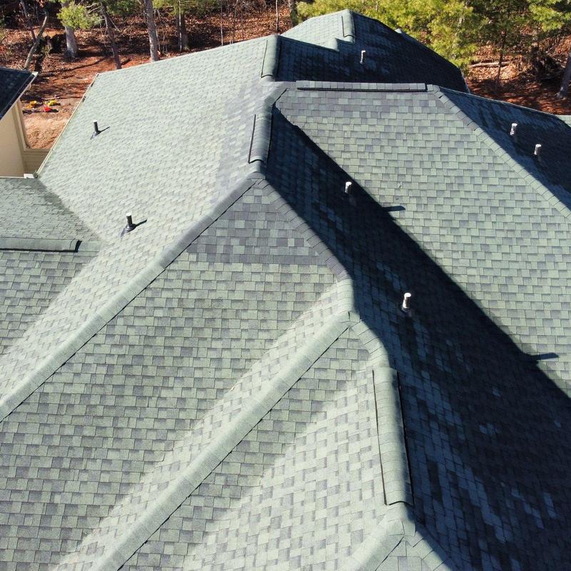 IKO Dynasty Emerald Green shingle roof with ridge caps