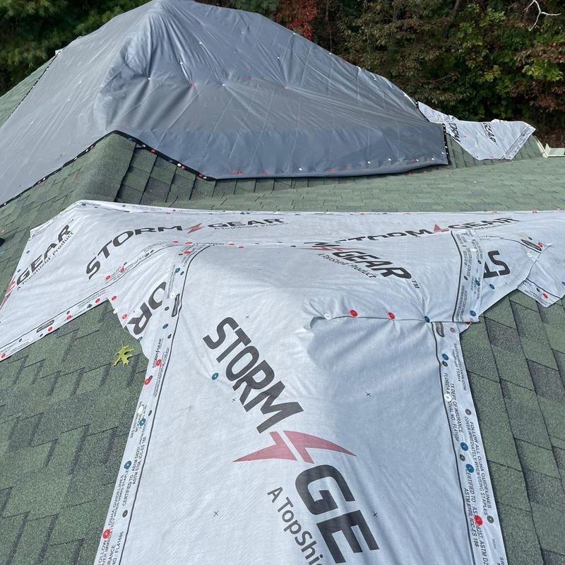 Roof underlayment installation with storm protection barriers