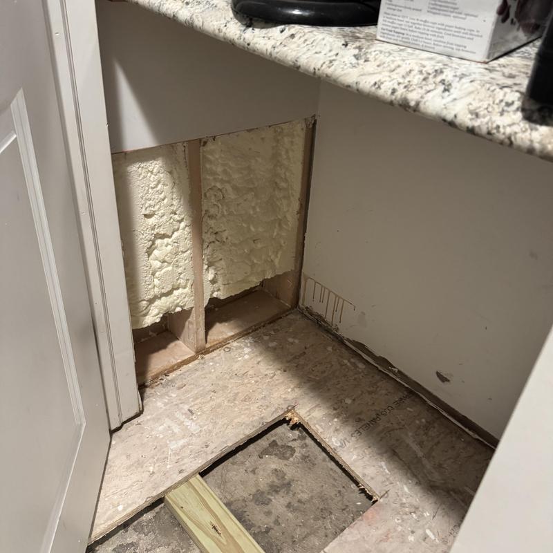 Hardwood floor and insulation repair under countertop