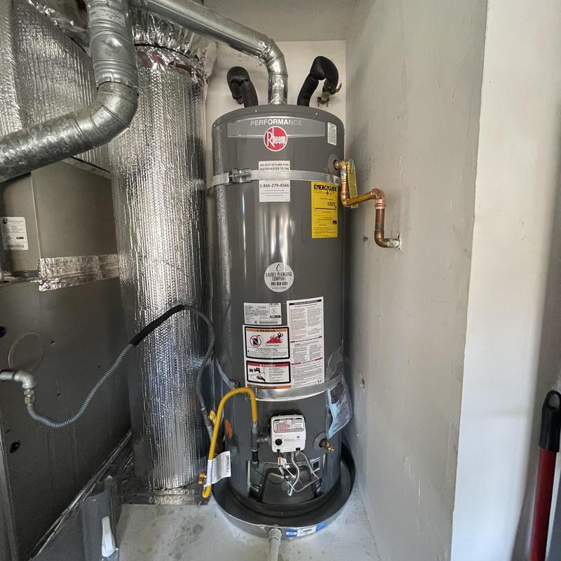 Rheem water heater with copper and gas lines