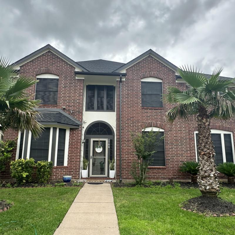 Tamko Titan XT Rustic Black roof with new gutters Tamko Titan XT Rustic Black roof with new gutters