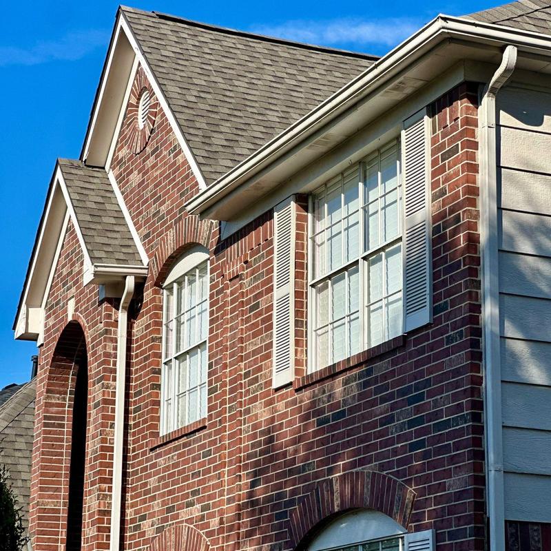 Tamko Titan XT Weathered Wood roof installation on brick home Tamko Titan XT Weathered Wood roof installation on brick home