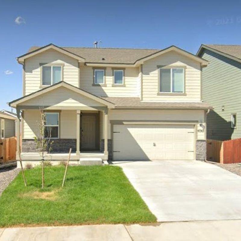 Garage roof flashing and nail sealing on residential home Garage roof flashing and nail sealing on residential home