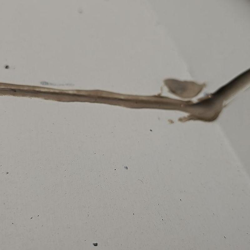 Garage ceiling drywall with water damage and crack Garage ceiling drywall with water damage and crack