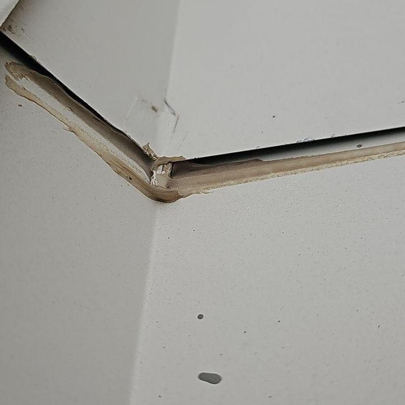 Roof flashing with sealed edges and nail spots Roof flashing with sealed edges and nail spots