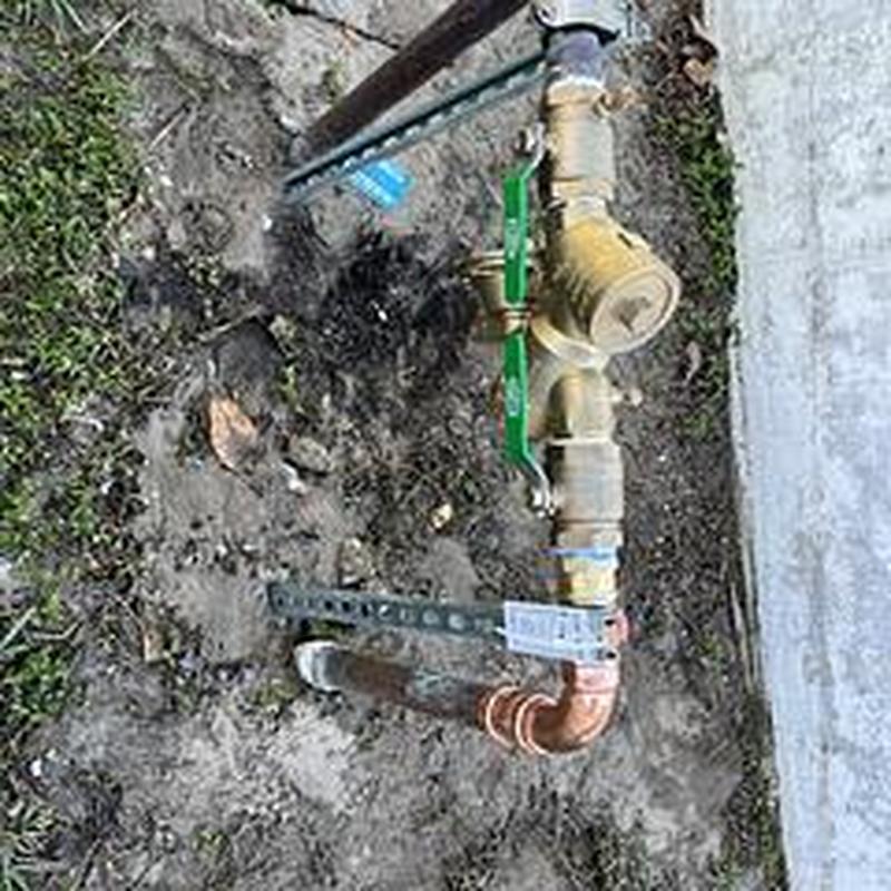 Backflow preventer with copper piping installation
