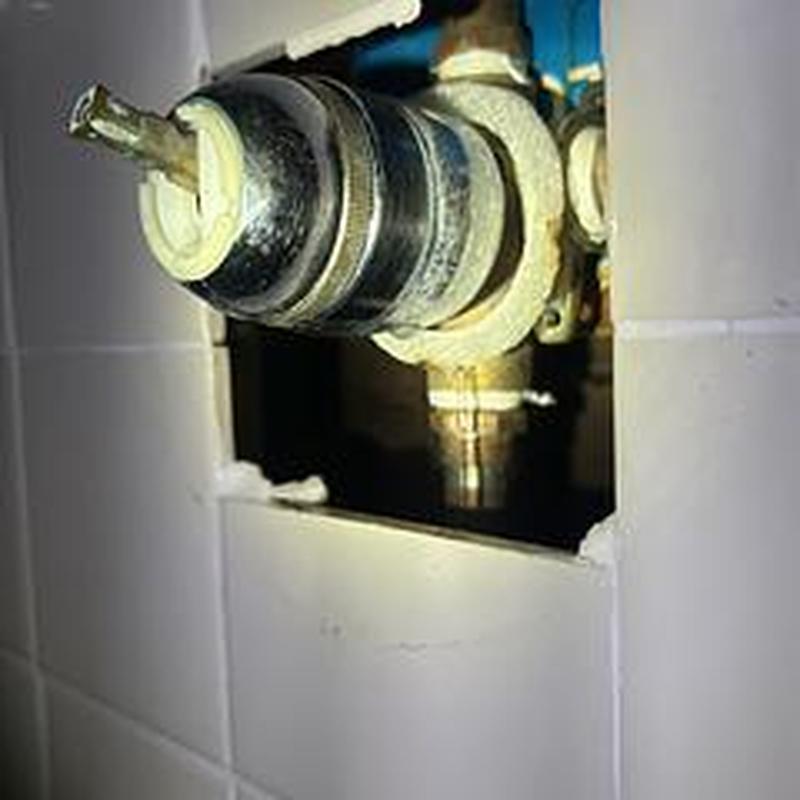 Delta shower valve repair in tiled wall cavity