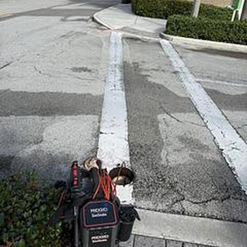 Sewer line hydrojetting with camera inspection setup