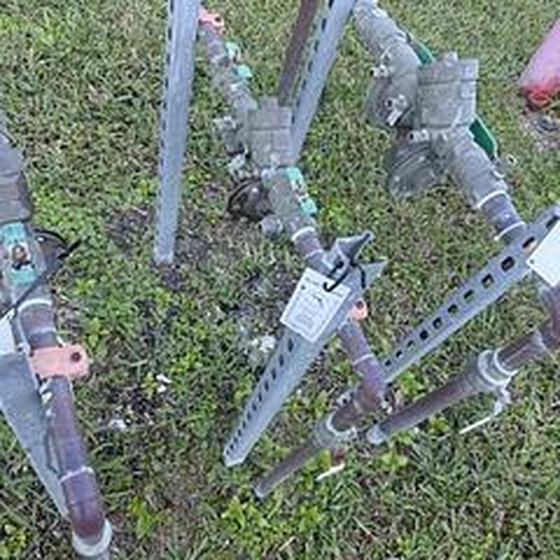 Backflow prevention device with certification tag