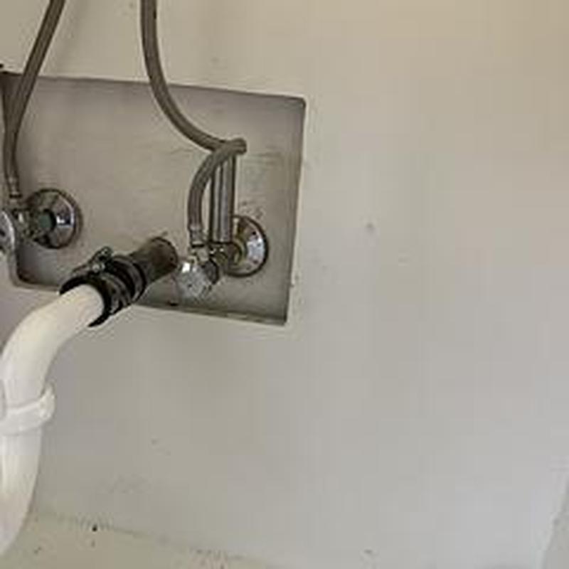 Cold water angle stop with hammer arrestor and strap