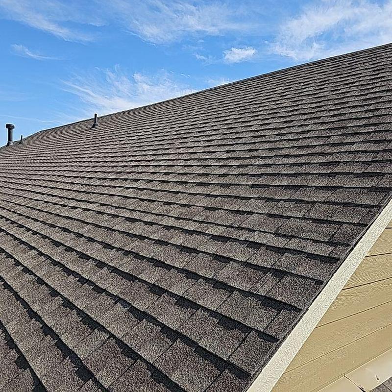 Asphalt shingle roof with sealed pipe jacks and collars Asphalt shingle roof with sealed pipe jacks and collars
