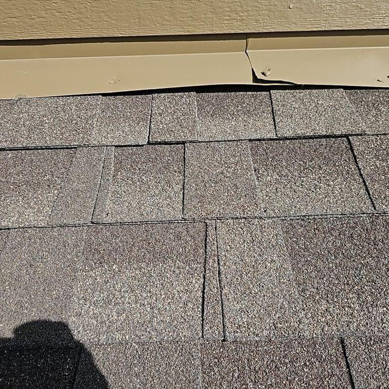 Roof shingles and metal flashing in good condition Roof shingles and metal flashing in good condition
