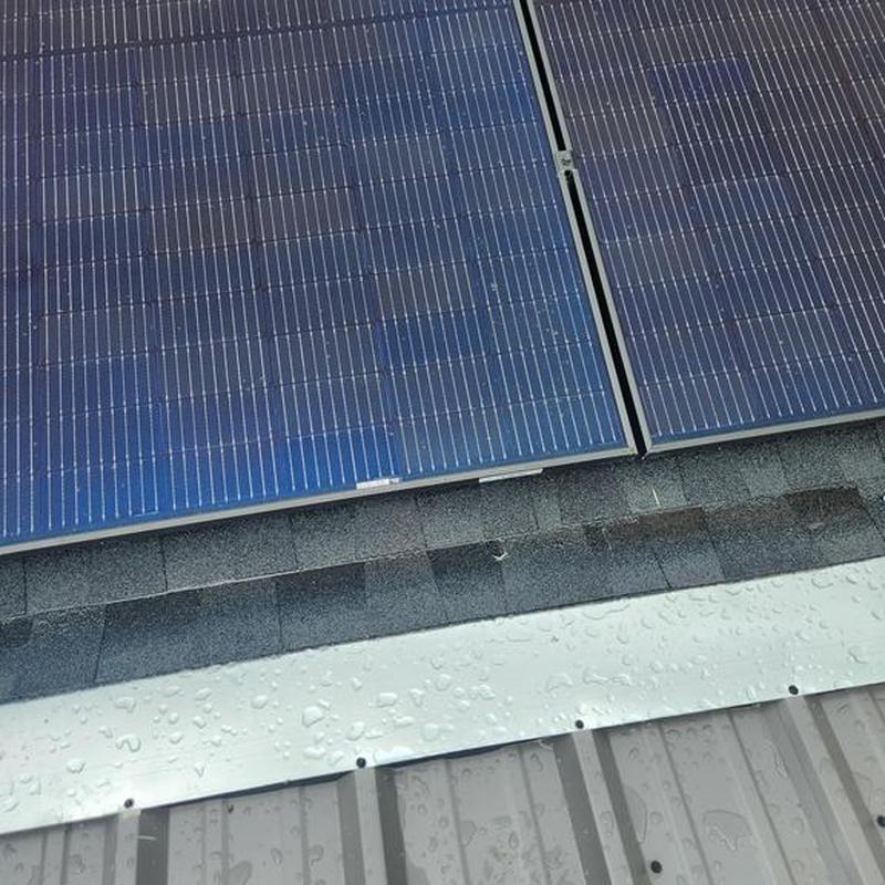 Solar panels on charcoal GAF Timberline HDZ roof