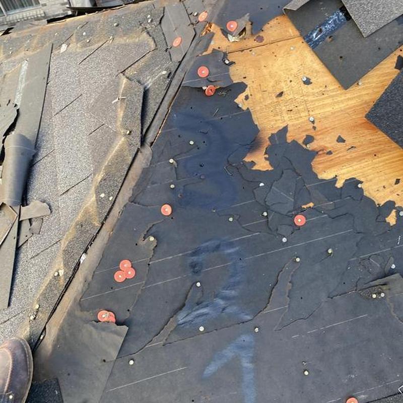 Roof underlayment removal with exposed plywood decking