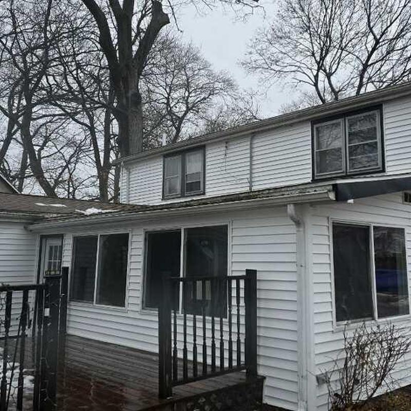 Royal Estate vinyl siding with aluminum gutters install