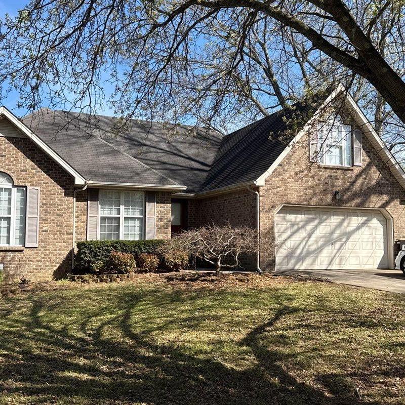 Asphalt shingle roof with hail damage inspection