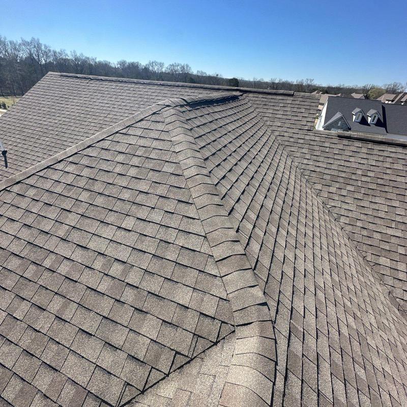 Asphalt shingle roof with ridge and hip inspection