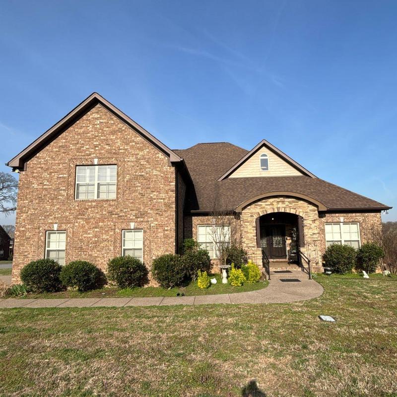 Asphalt shingle roof with hail damage inspection