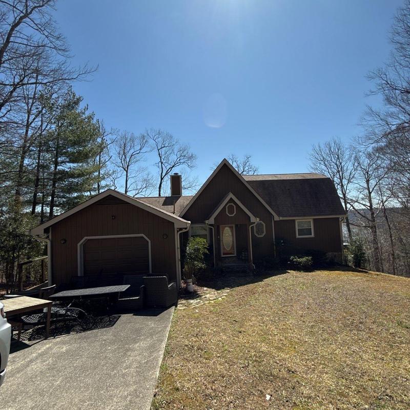 Asphalt shingle roof with hail damage inspection