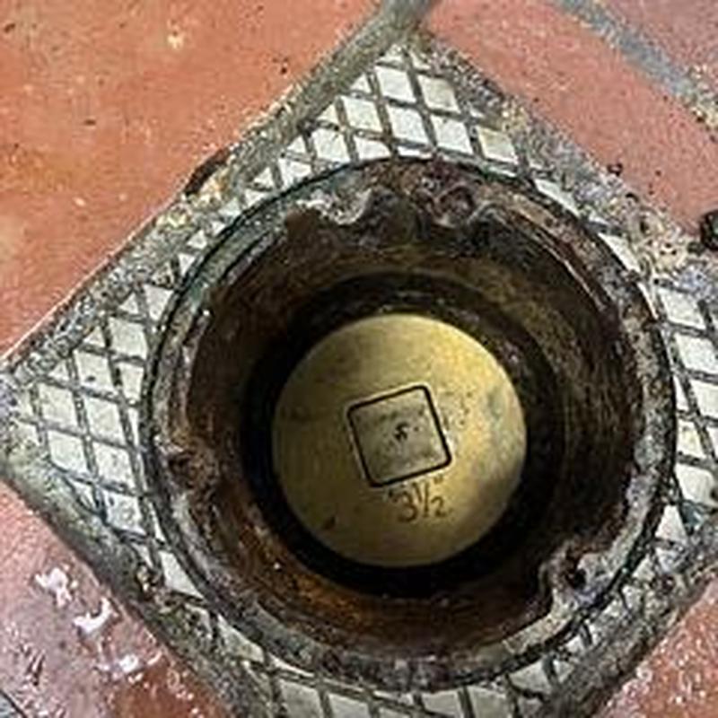 Kitchen main drain inspection with camera in floor cage