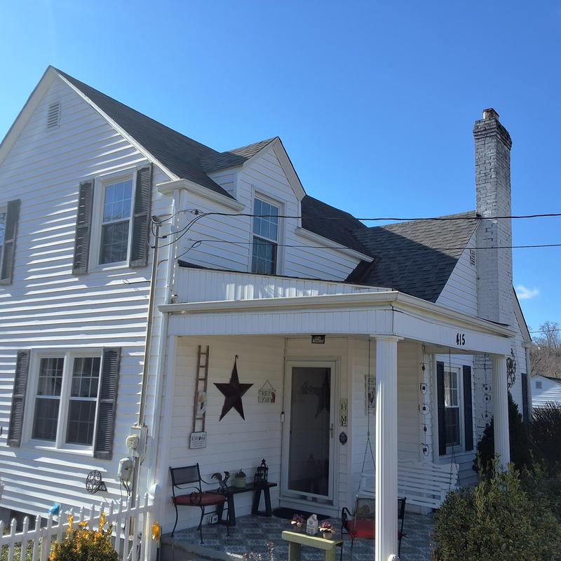 Asphalt shingle roof inspection on aged home