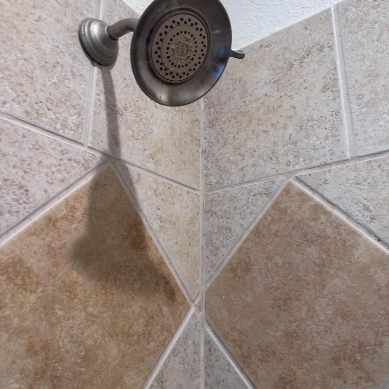 Shower cartridge and trim installation on tiled wall Shower cartridge and trim installation on tiled wall