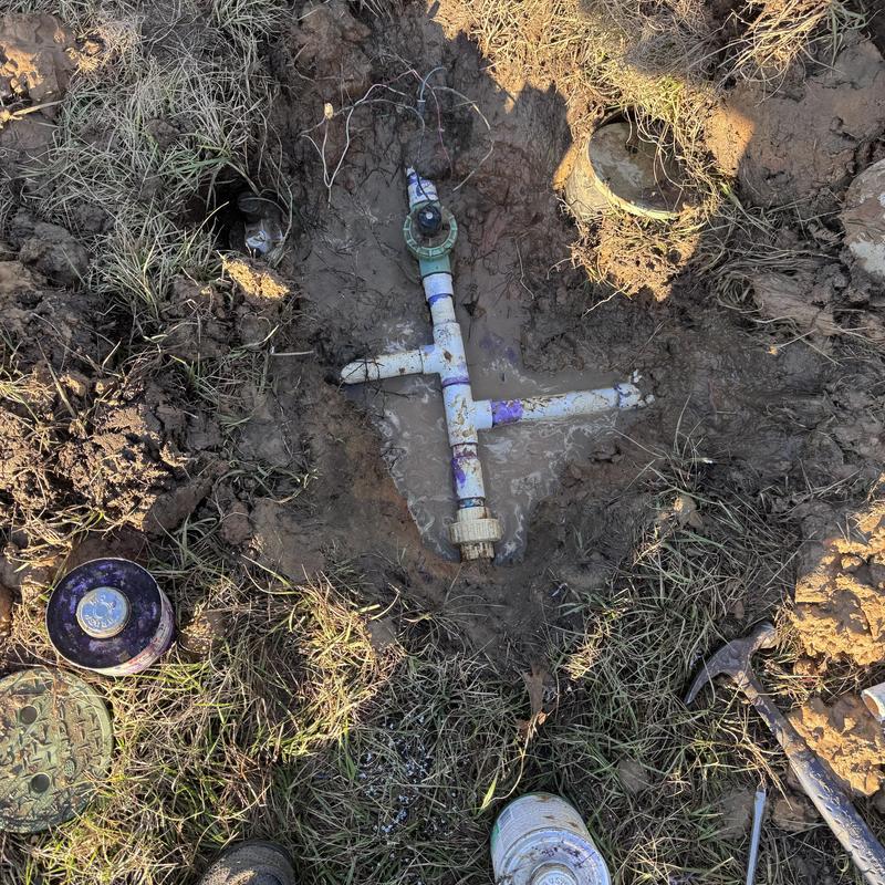 Irrigation system valve and PVC pipe leak repair site