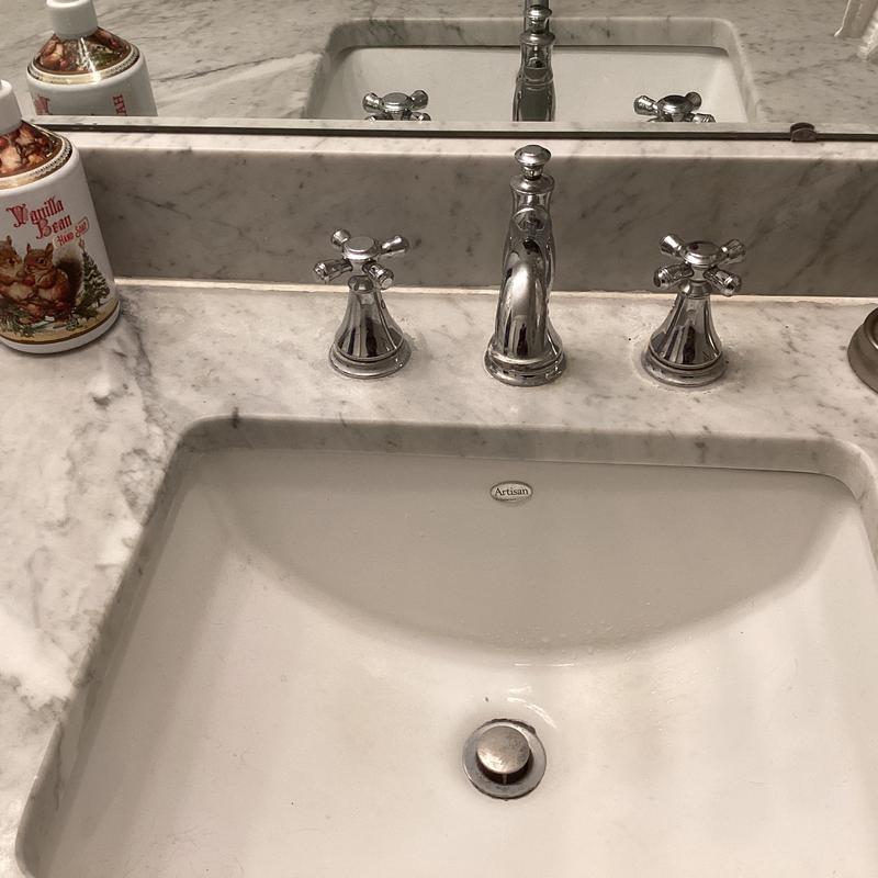 Delta bathroom faucet with replaced cartridges and seats