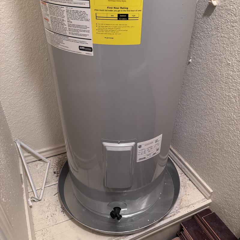 Water heater with new pan and ball valve installed