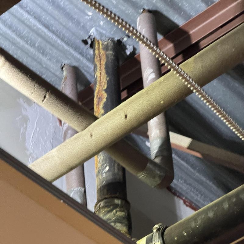 2-inch cast iron pipe section between floors