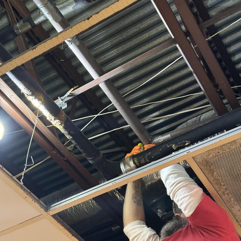 2-inch cast iron pipe fitting between floors installation