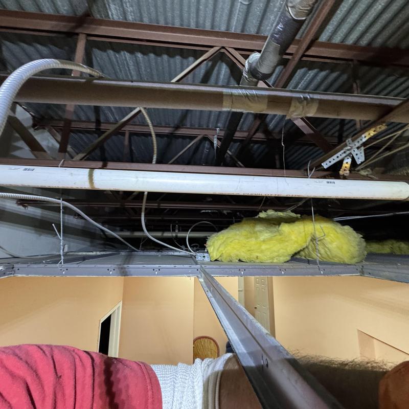 2-inch cast iron pipe section between floors with insulation