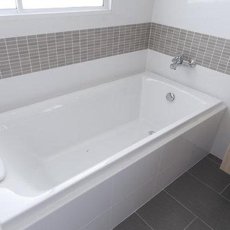 Second bathroom tub pop-up drain and faucet system