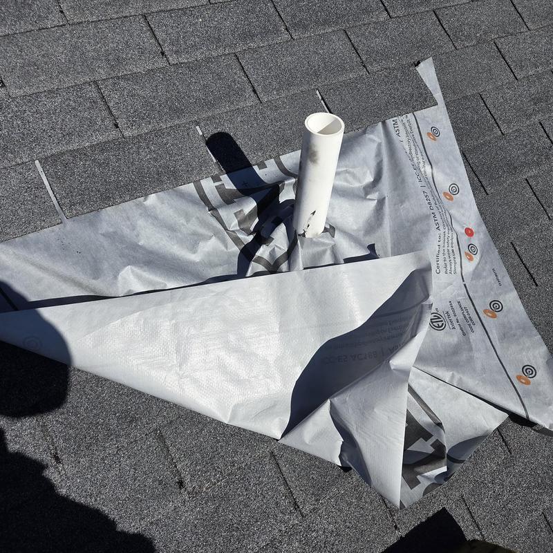 Pipe boot on roof with protective underlayment exposed